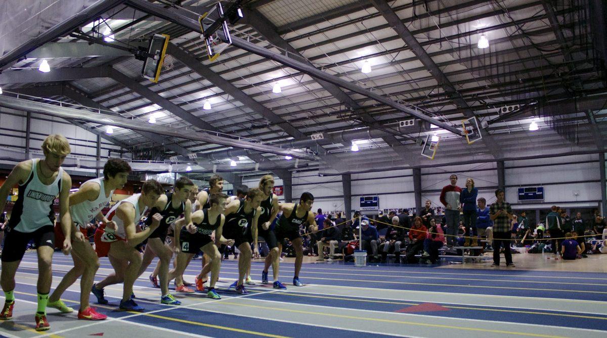 Men's indoor track team prepare to run Feb. 15, 2014. photo/ Annelise Suber