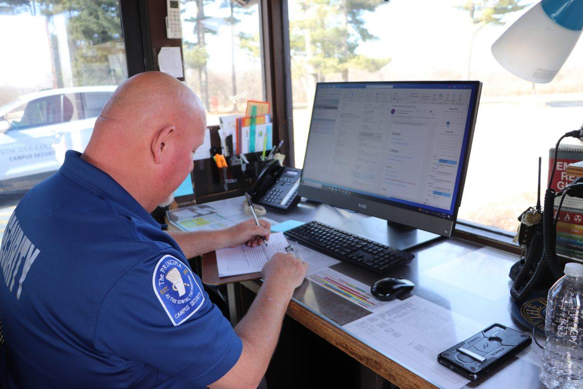 Campus Security officer Mac McCartney works in Principia Colleges gatehouse on February 21, 2023. Photo by Aubrey Hawke 