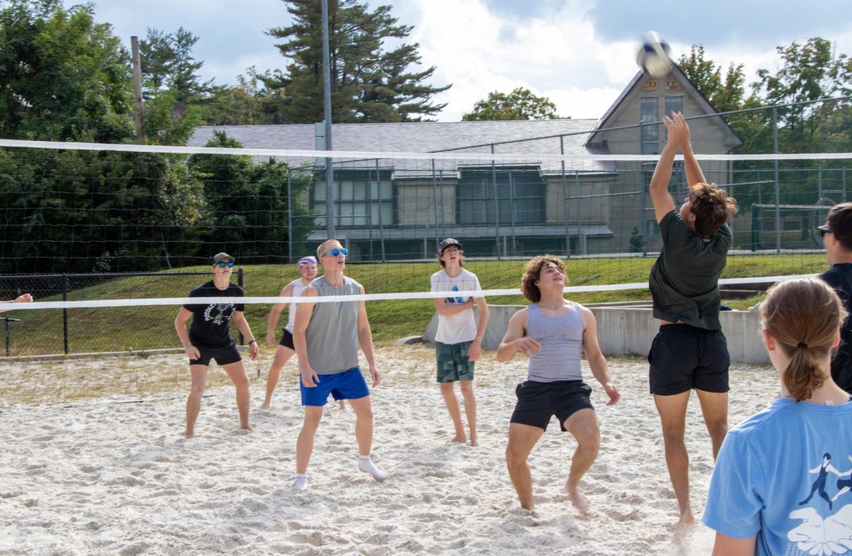 Anderson’s Nick Dolci and Skyler Stock challenge for the ball in a volleyball game
between Anderson and a combined Ferguson/Buck team.